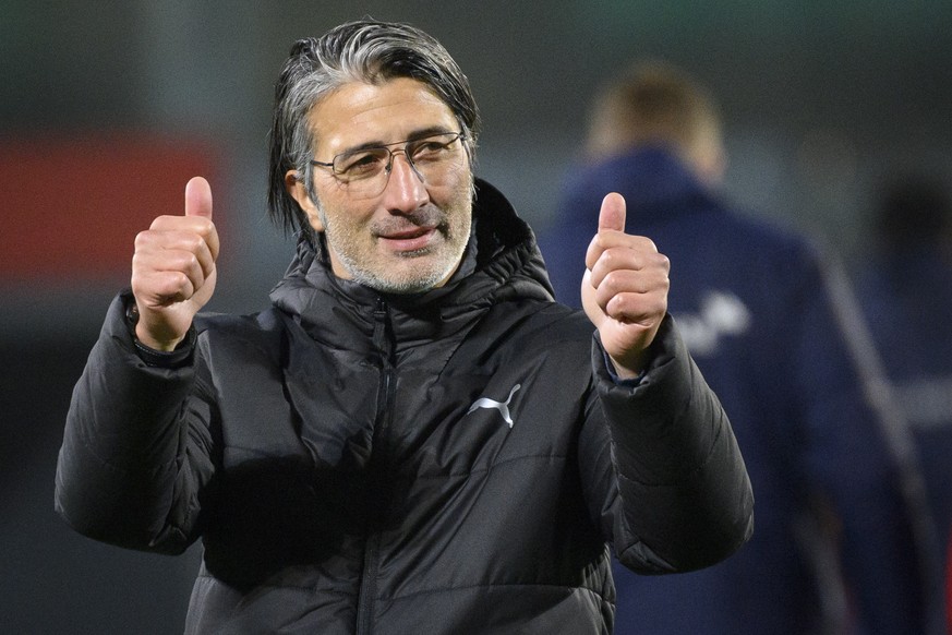 epa09521023 Switzerland&#039;s head coach Murat Yakin celebrates after the FIFA World Cup 2022 European Qualifying Group C soccer match between Lithuania and Switzerland at LFF stadium in Vilnius, Lit ...