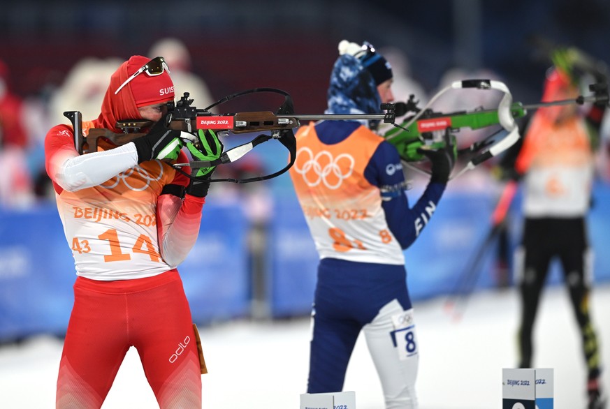 epa09729278 Benjamin Weger of Switzerland in action during the Biathlon Mixed Relay at the Zhangjiakou National Biathlon Centre at the Beijing 2022 Olympic Games, Zhangjiakou, China, 05 February 2022. ...