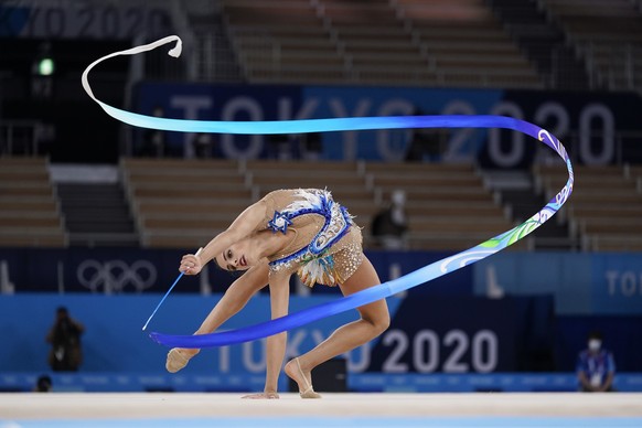 Linoy Ashram, of Israel, performs during the rhythmic gymnastics individual all-around final at the 2020 Summer Olympics, Saturday, Aug. 7, 2021, in Tokyo, Japan. (AP Photo/Ashley Landis)