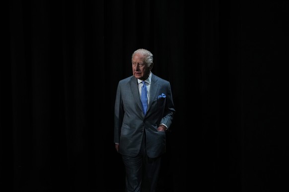 Britain's King Charles III arrives to join English actor Idris Elba in meeting students taking part in workshops organised by National Youth Music Theatre (NYMT) at The Other Palace in London, Th ...