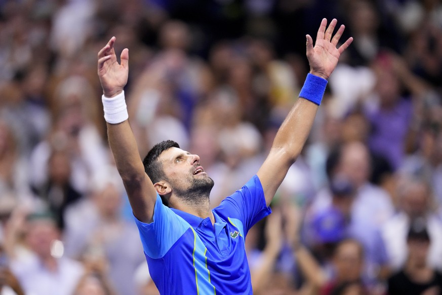 Novak Djokovic, of Serbia, reacts after defeating Daniil Medvedev, of Russia, in the men&#039;s singles final of the U.S. Open tennis championships, Sunday, Sept. 10, 2023, in New York. (AP Photo/Manu ...