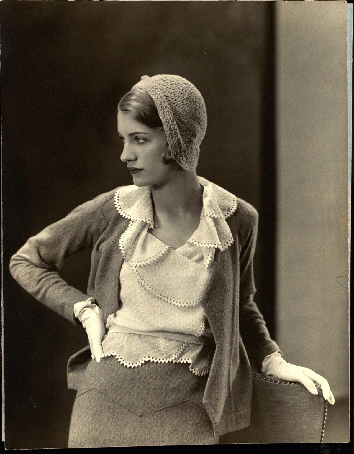 Lee Miller models a Mirande suit with gloves and crocheted hat. (Photo by George Hoyningen-Huene/Condé Nast via Getty Images)