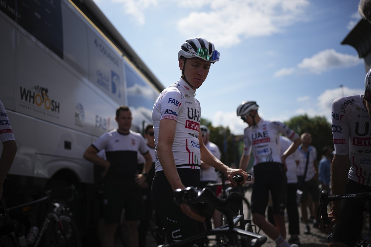 Slovenia's Tadej Pogacar and his UAE Team Emirates fellow riders leave for a team training in Florence, Italy, Thursday, June 27, 2024, two days before the start of the Tour de France cycling rac ...