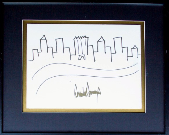 epa06109606 A handout photo made available by 

A drawing by US President Donald J. Trump shown in Los Angeles, California, USA 25 July 2017. The signed drawing depicting the New York City skyline and ...