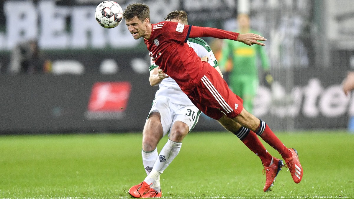 Bayern's Thomas Mueller jumps for the ball during the German Bundesliga soccer match between Borussia Moenchengladbach and FC Bayern Munich in Moenchengladbach, Germany, Saturday, March 2, 2019.  ...