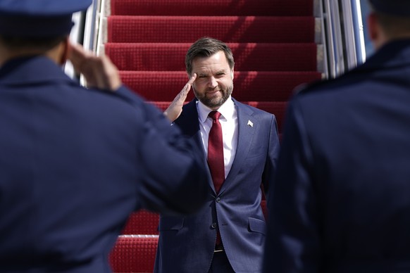 Vice President JD Vance salutes as he walks off Air Force Two, Wednesday, March 18, 2026 at Joint Base Andrews, Md., returning from a day trip to Waterford Township, Mich. (Elizabeth Frantz/The New Yo ...