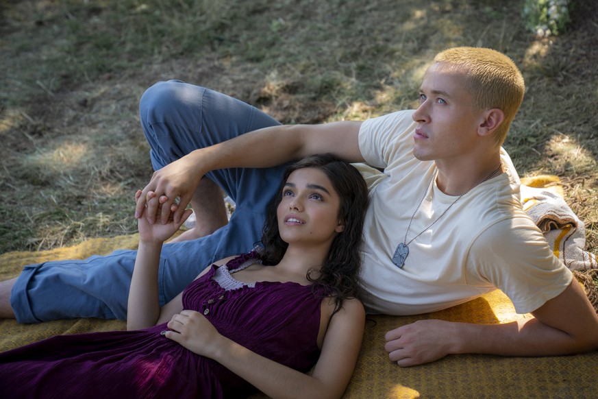 This image released by Lionsgate shows Rachel Zegler as Lucy Gray Baird, left, and Tom Blyth as Coriolanus Snow in a scene from "The Hunger Games: The Ballad of Songbirds and Snakes." (Gurrah...
