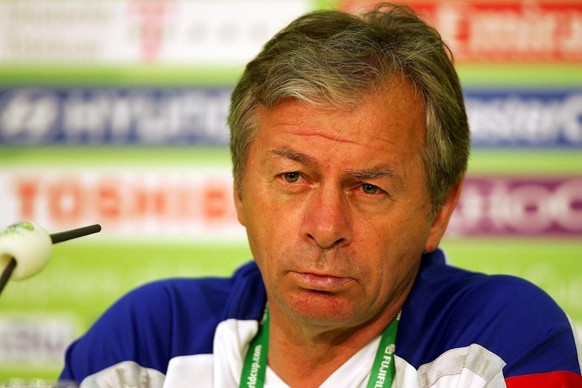 Ilija Petkovic, coach of Serbia-Montenegro, listens to a journalist&#039;s question during a press conference at the FIFA World Cup Stadium in Munich, Germany, Tuesday 20 June 2006. Serbia-Montenegro  ...