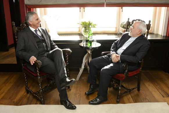 Swiss Miniter of Foreign Affairs Didier Burkhalter, left, speaks with Iranian Foreign Minister Mohammad Javad Zarif, right, during a bilateral meeting at the 46th Annual Meeting of the World Economic  ...