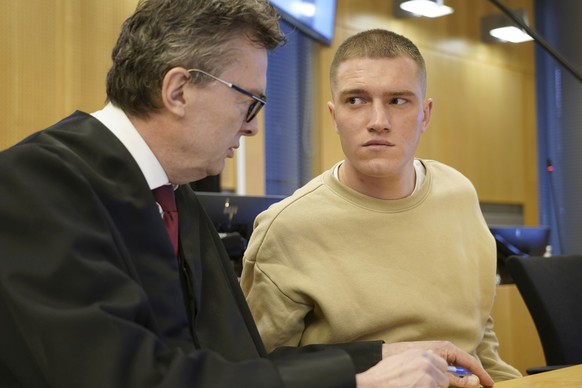 Former member of Russian private military contractor Wagner Group Andrey Medvedev, right, listens to his lawyer Brynjulf ​​​​​​Risnes during a court hearing in Oslo, Tuesday, April 25, 2023. Medvedev, w...
