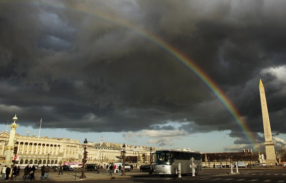A rainbow is seen over the Place de la Concorde square in Paris, Monday, March 9, 2009. (AP Photo/Muhammed Muheisen)