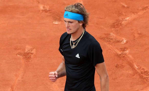 epa07622676 Alexander Zverev of Germany plays Fabio Fognini of Italy during their menâs round of 16 match during the French Open tennis tournament at Roland Garros in Paris, France, 03 June 2019. EP ...