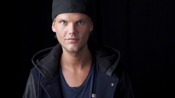 FILE - In this Aug. 30, 2013 file photo, Swedish DJ-producer, Avicii poses for a portrait in New York. Swedish-born Avicii, whose name is Tim Bergling, was found dead, Friday April 20, 2018, in Muscat ...