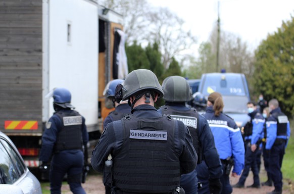 In this photo providedby the French Gendarmerie, gendarmes are deployed, near Lieuron, Brittany, France, Saturday, Jan. 2, 2021. A French prosecutor said police detained seven people Saturday, includi ...