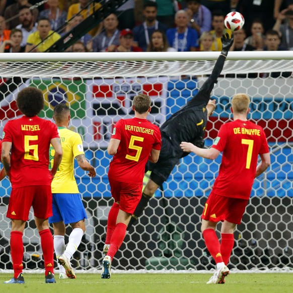 epa06869740 Belgium&#039;s goalkeeper Thibaut Courtois (2-R) in action during the FIFA World Cup 2018 quarter final soccer match between Brazil and Belgium in Kazan, Russia, 06 July 2018. Belgium won  ...