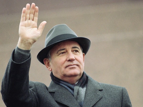 FILE - Soviet President Mikhail Gorbachev waves from the Red Square tribune during a Revolution Day celebration, in Moscow, Soviet Union, Tuesday, Nov. 7, 1989. Russian news agencies are reporting tha ...