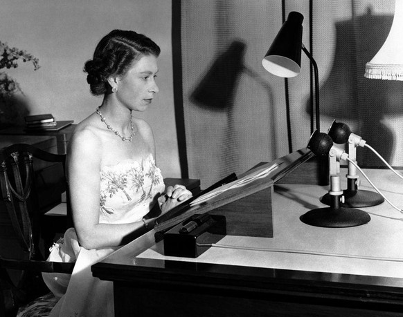 1953: Queen Elizabeth II making her Christmas broadcast to the peoples of the Commonwealth from Government House, Auckland, New Zealand.