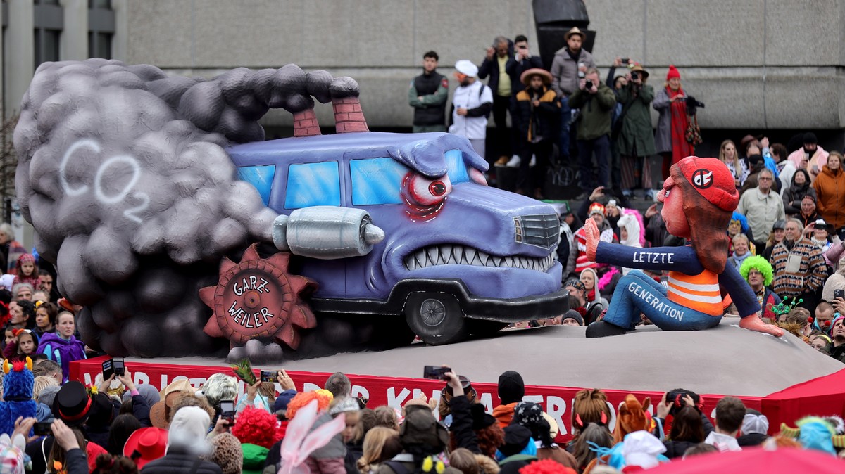 epa10479929 A carnival float titled 'Who is the climate terrorist here?' parades during the annual Rose Monday (Rosenmontag) parade in Duesseldorf, Germany, 20 February 2023. Rose Monday is  ...