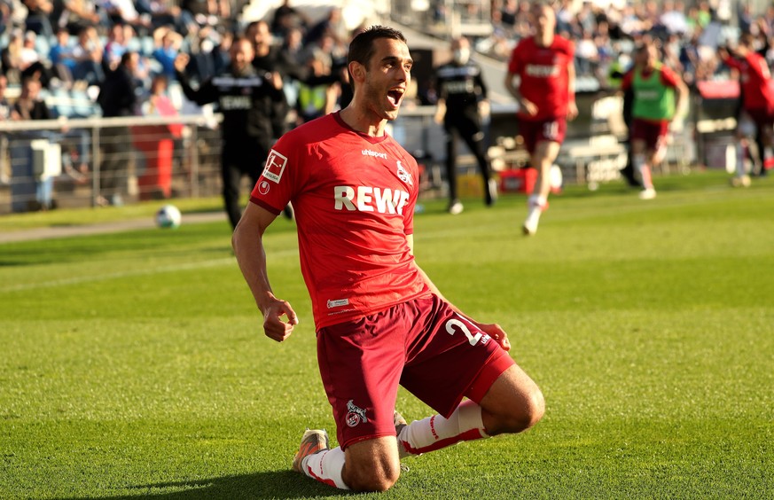 epa09235242 Cologne&#039;s Ellyes Skhiri celebrates scoring the 5-1 lead during the German Bundesliga relegation play-off, second leg soccer match between Holstein Kiel and 1. FC Koeln in Kiel, German ...