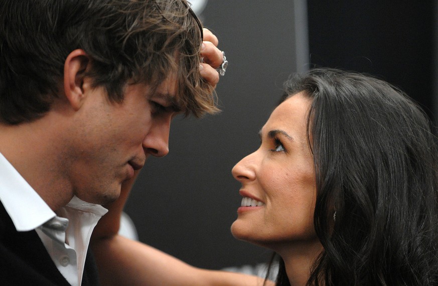 Actor Ashton Kutcher and wife Demi Moore attend the CW network party for &quot;The Beautiful Life,&quot; in New York, on Saturday, Sept. 12, 2009. (AP Photo/Peter Kramer)