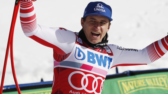 Austria's Matthias Mayer celebrates his third-place finish in the Men's World Cup super-G skiing race Friday, Dec. 6, 2019, in Beaver Creek, Colo. (AP Photo/John Locher)