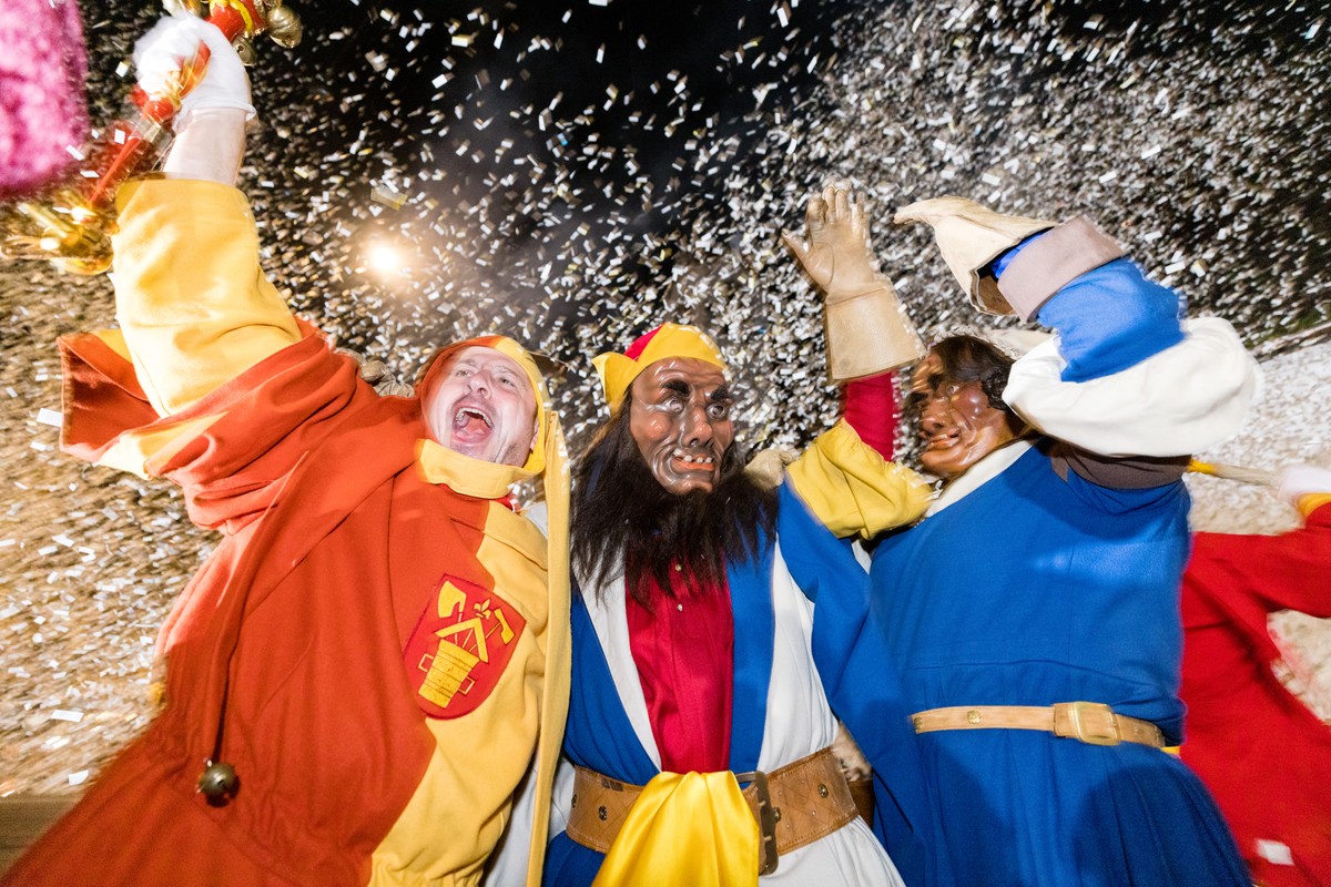 Carnival revellers attend the 'Urknall' (Big Bang), which occurs at Kapellplatz at five in the morning and marks the start of the Lucerne carnival (Fasnacht) on Fat Thursday, February 24, 20 ...
