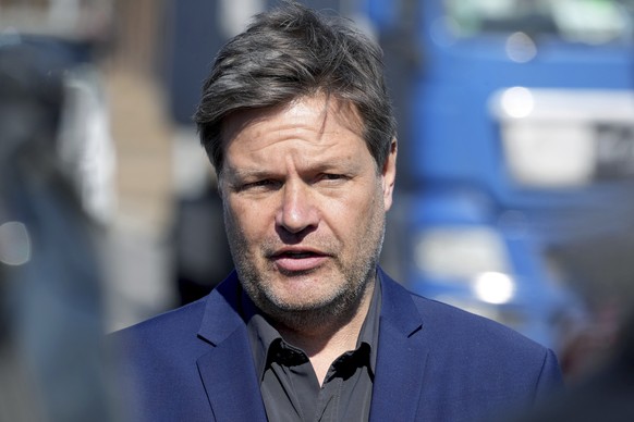 German Economy and Climate Minister Robert Habeck, delivers a statement in front of the new Tesla Gigafactory for electric cars in Gruenheide near Berlin, Germany, Tuesday, March 22, 2022. Electric ca ...