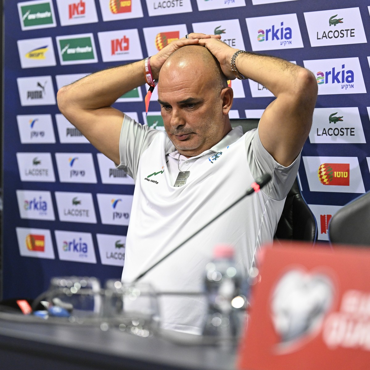 Israeli head coach Alon Hazan reacts during a press conference before the training session for the Euro 2024 group I qualifying soccer match between Israel and Switzerland at the Pancho Arena in Felcs