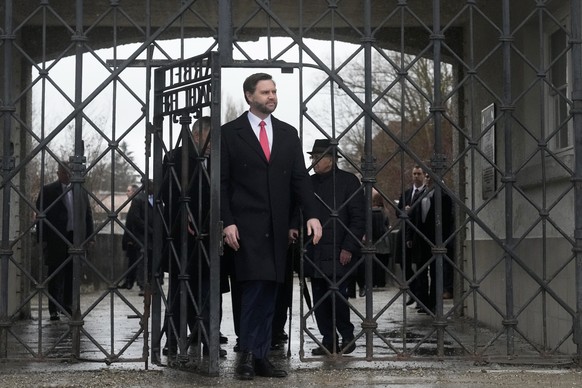 KEYPIX - U.S. Vice President JD Vance enters the Dachau Concentration Camp Memorial Site outside Munich, Germany, Thursday, Feb. 13, 2025. (AP Photo/Matthias Schrader)