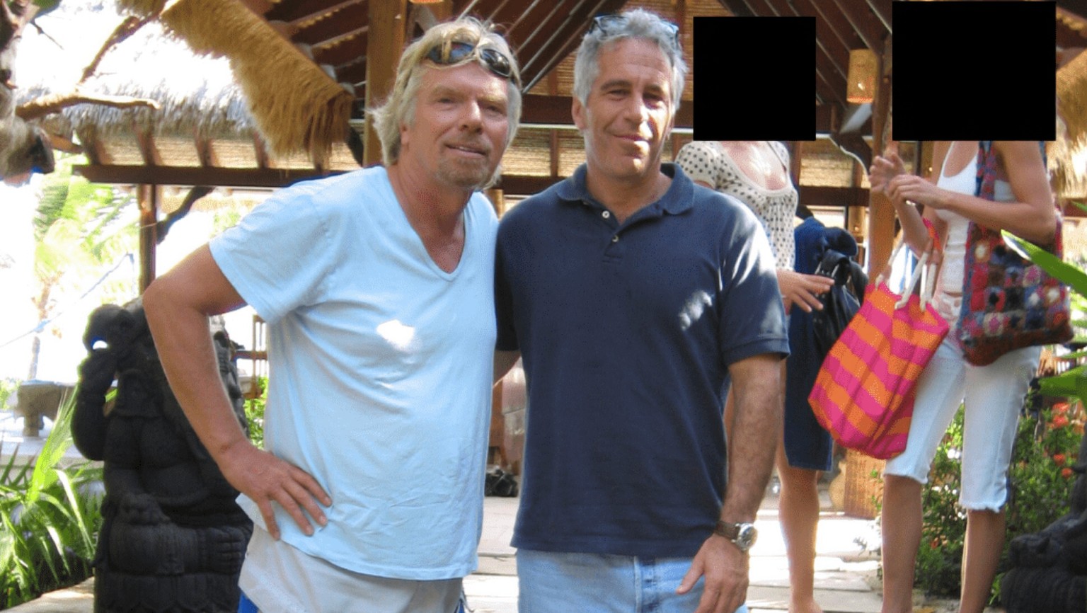 This undated, redacted photo released by the U.S. Department of Justice shows Jeffrey Epstein, right, with Richard Branson. (U.S. Department of Justice via AP)
Justice Department Jeffrey Epstein