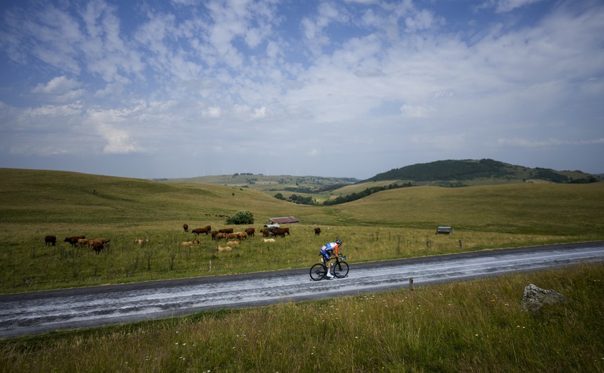 Latvia's Krists Neilands rides breakaway during the tenth stage of the Tour de France cycling race over 167 kilometers (104 miles) with start in Vulcania and finish in Issoire, France, Tuesday, J ...