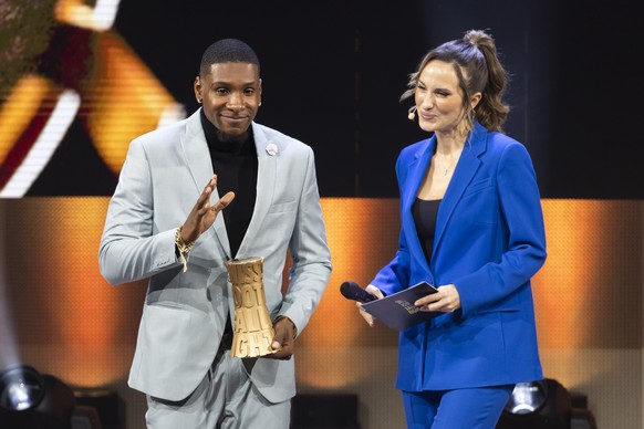 Brighton Labeau, winner of the challenge league player 2022 award, reacts beside moderator Viola Tami at the Swiss Football Night 2022 awards, in Bern, Switzerland, Monday, January 23, 2023. (KEYSTONE ...