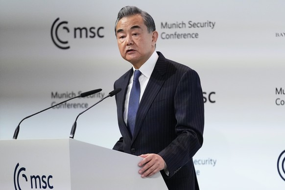FILE - China&#039;s Director of the Office of the Central Foreign Affairs Commission Wang Yi speaks at the Munich Security Conference at the Bayerischer Hof Hotel in Munich, on Feb. 18, 2023. White Ho ...
