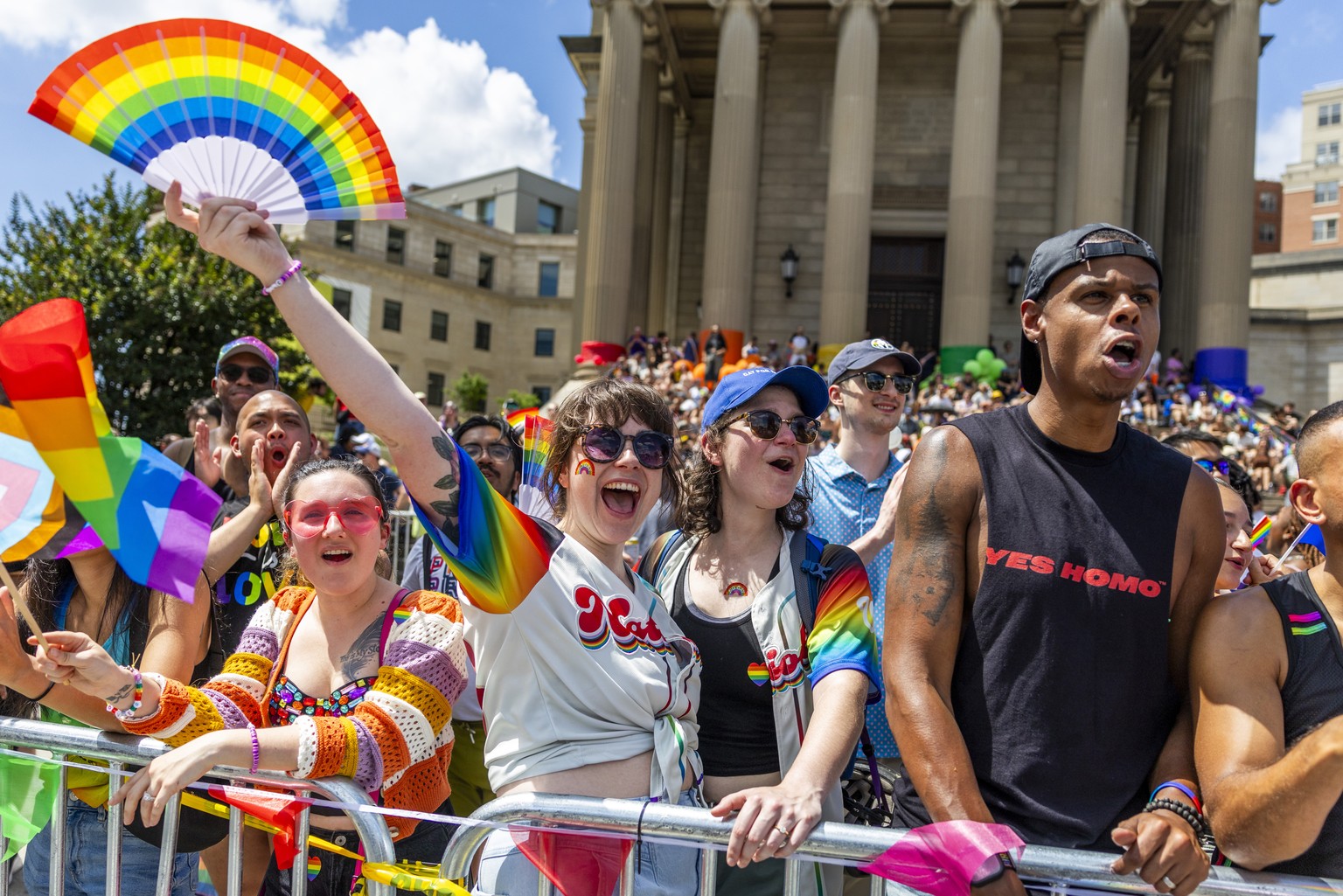epa12163033 Parade-goers cheer for participants during the World Pride 2025 parade in Washington, DC, USA, 07 June 2025. World Pride 2025 is an international LGBTQ+ celebration held in Washington, D.C ...