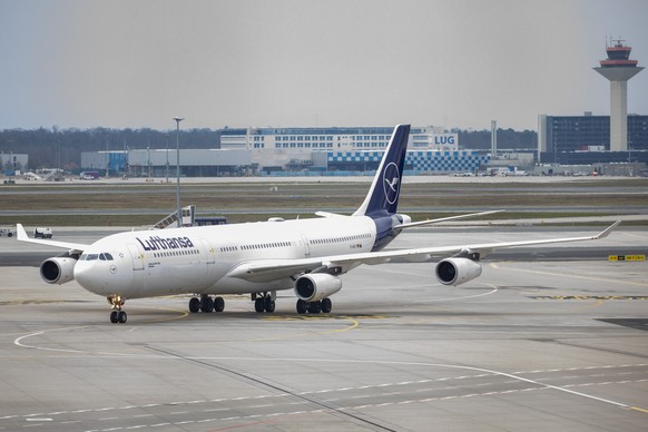 epa11215798 A Lufthansa plane arrives to taxi, at Frankfurt Airport, in Frankfurt am Main, Germany, 12 March 2024. The UFO cabin crew union has called on its members to strike, to press their demands  ...