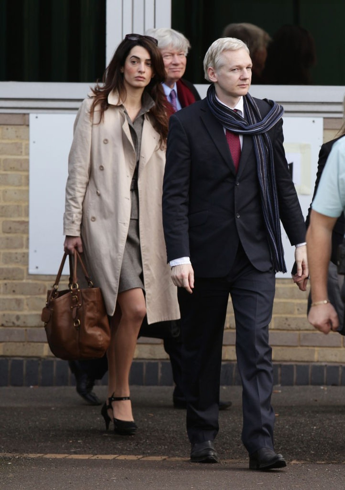 Amal Alamuddin (left) walking alongside WikiLeaks founder Julian Assange as they leave Belmarsh Magistrates Court after his extradition hearing to Sweden to be prosecuted over claims of sexual assault ...