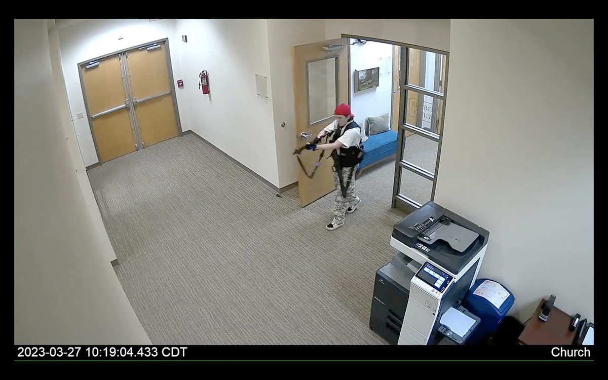 epa10546343 A frame grab from a handout surveillance video released by Metro Nashville Police Department shows alleged shooter they identify as Audrey Elizabeth Hale during the shooting at the Covenan ...