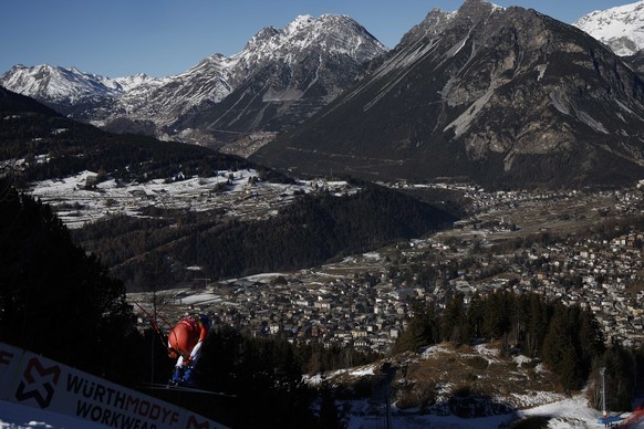 Switzerland&#039;s Marco Odermatt is airborn during an alpine ski, men&#039;s World Cup downhill training, in Bormio, Italy, Friday, Dec. 27, 2024. (AP Photo/Gabriele Facciotti)
