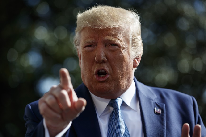 President Donald Trump talks to reporters on the South Lawn of the White House, Friday, Oct. 4, 2019, in Washington. (AP Photo/Evan Vucci)
Donald Trump