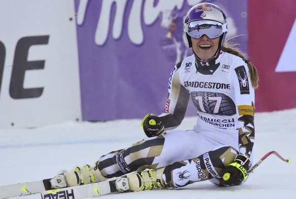 United States&#039; Lindsey Vonn celebrates after completing an alpine ski, women&#039;s World Cup downhill, in Garmisch-Panterkirchen, Germany, Saturday, Jan. 21, 2017. (AP Photo/Marco Tacca)