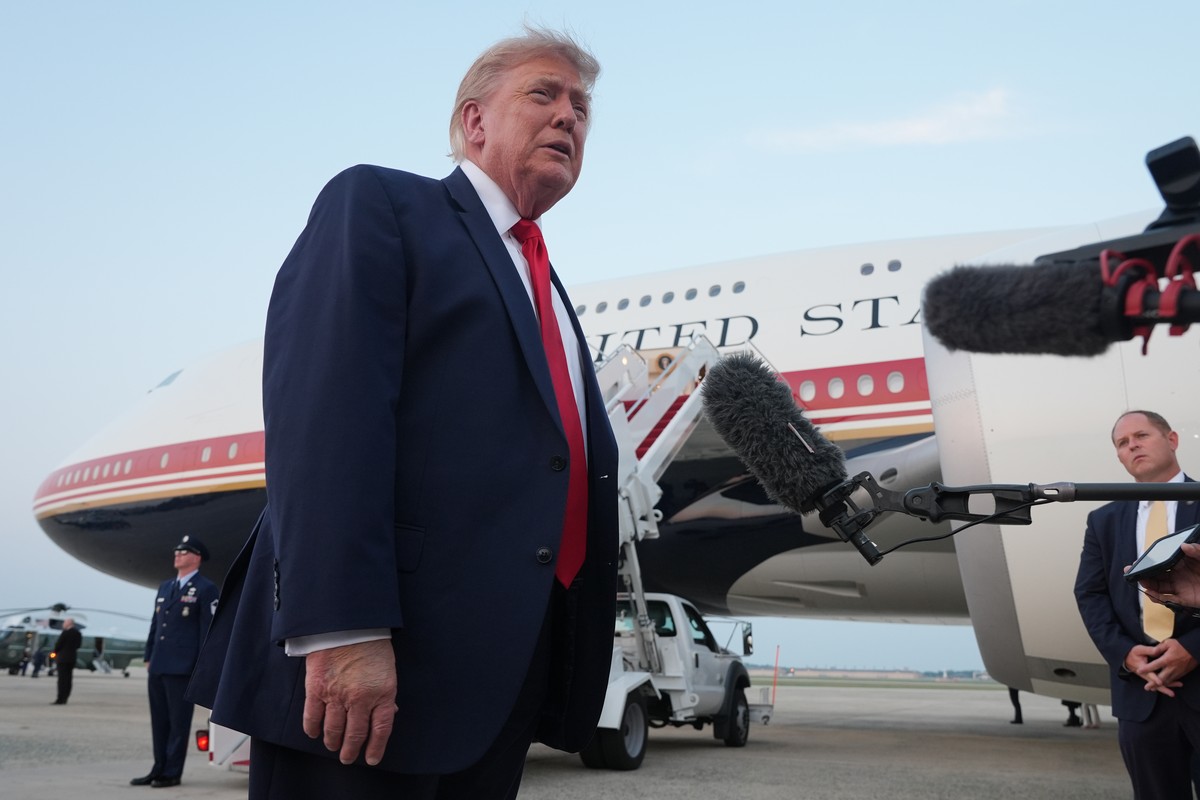 President Donald Trump speaks to reporters as he exits Air Force One at Joint Base Andrews, Md., after attending the World Cup final soccer match, Sunday, July 19, 2026. (AP Photo/Jacquelyn Martin)
Do ...