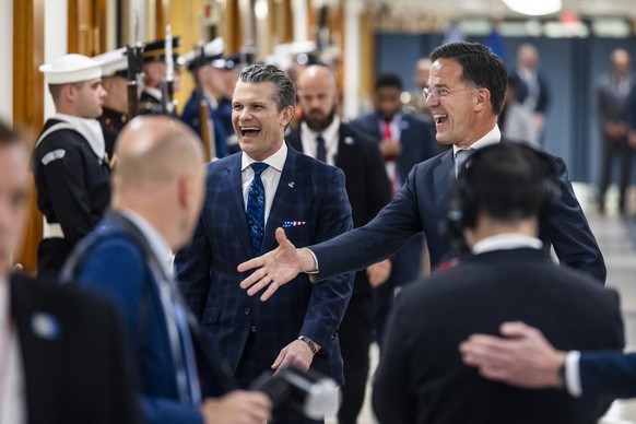 epa12051235 US Defense Secretary Pete Hegseth (C-L) welcomes NATO Secretary General Mark Rutte (C-R) to the Pentagon in Arlington, Virginia, USA, 24 April 2025. Hegseth is under fire after media repor ...