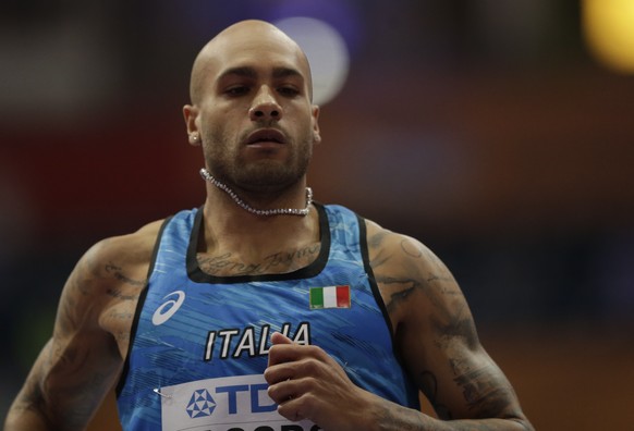 epa09835630 Lamont Marcell Jacobs of Italy competes in the men?s 60m heats at the World Athletics Indoor Championships in Belgrade, Serbia, 19 March 2022. EPA/ANDREJ CUKIC