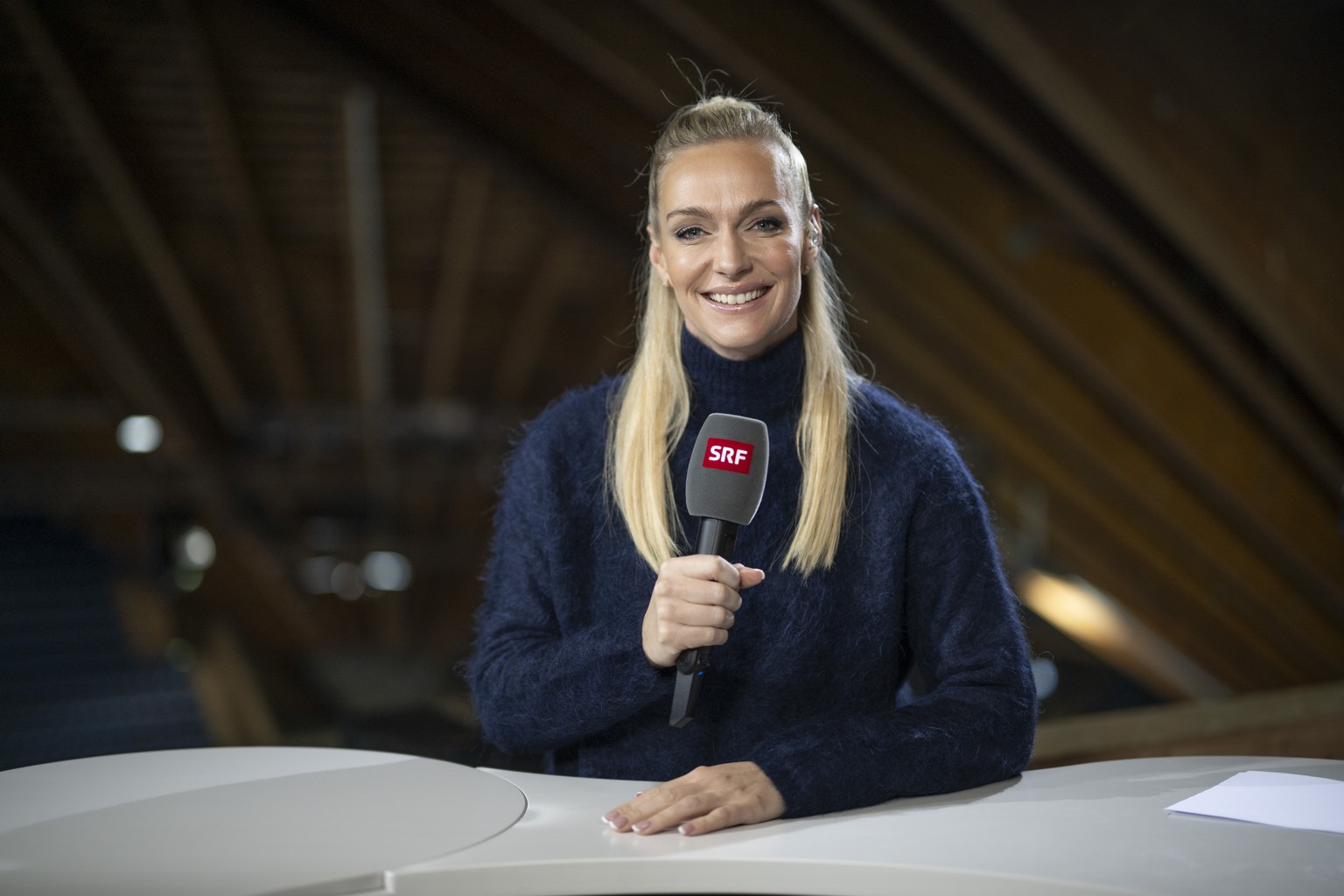 Annette Fetscherin, TV anchor for SRF, poses prior the game between HC Fribourg-Gotteron of Switzerland and HC Sparta Praha of Czech Republic, at the 97th Spengler Cup ice hockey tournament in Davos,  ...
