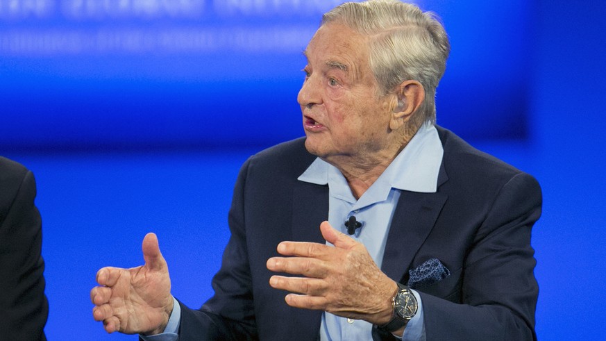 FILE - In this Sept. 27, 2015, file photo, George Soros, chairman of Soros Fund Management, talks during a television interview for CNN at the Clinton Global Initiative in New York. Soros, the New Yor ...