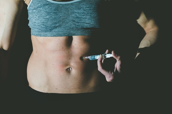 Young woman inject anabolic steroids doping in the muscle abuse in sport concept xkwx muscular, medical, beauty, strength, doping, body, drug, fit, white, fitness, anabolic, steroid, attractive, athle ...