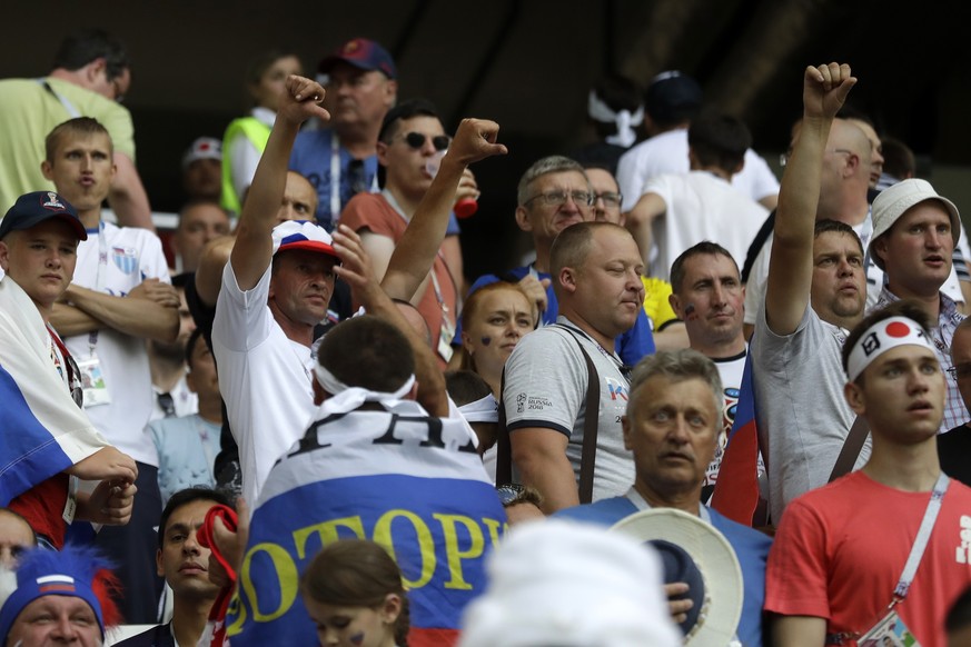 Soccer fans react during the group H match between Japan and Poland at the 2018 soccer World Cup at the Volgograd Arena in Volgograd, Russia, Thursday, June 28, 2018. (AP Photo/Andrew Medichini)