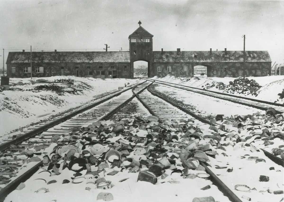 epa08149665 A handout photo made available by the Auschwitz Memorial and Museum shows the unloading ramp and the main gate called the 'Gate of Death' at the former German Nazi concentration  ...