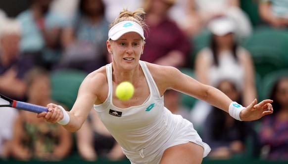 epa07703087 Alison Riske of USA returns to Ashleigh Barty of Australia in their fourth round match during the Wimbledon Championships at the All England Lawn Tennis Club, in London, Britain, 08 July 2 ...