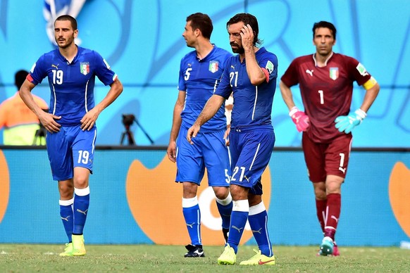 Natal/Brasilien - FIFA Fussball WM 2014, Italien vs. Uruguay: Gianluigi Buffon, Leonardo Bonucci, Thiago Motta, Andrea Pirlo PUBLICATIONxNOTxINxITA

Natal Brazil FIFA Football World Cup 2014 Italy v ...